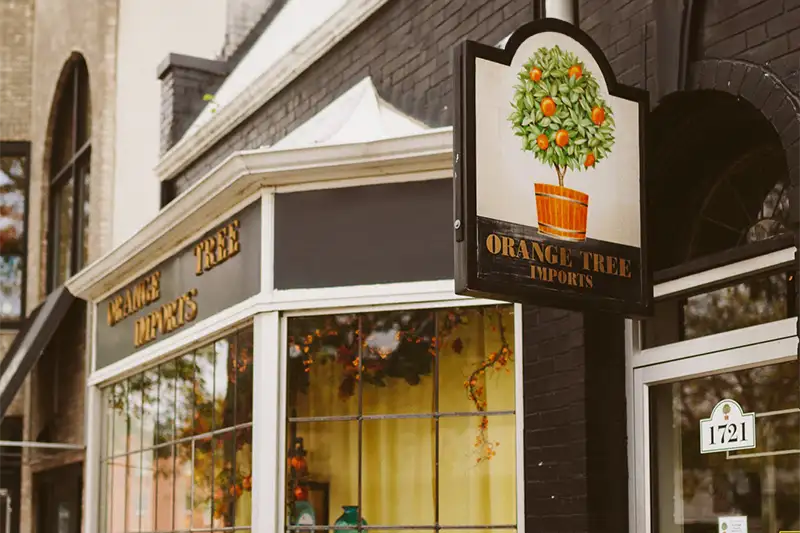 Exterior of Orange Tree Imports, a premier specialty kitchen and gift shop on Monroe Street, located just steps from The Buckingham Inn in Madison, WI.
